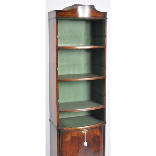 654 - A 19th Century walnut bookcase cabinet vitrine of slender proportions. Adjustable shelves with paint... 