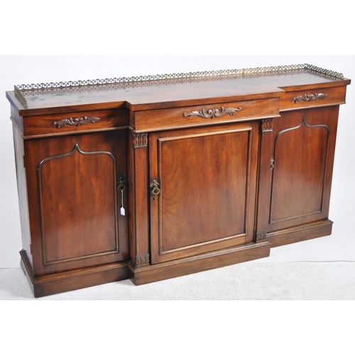 658 - A 19th Century Regency mahogany breakfront sideboard credenza cabinet having a brass gallery top wit... 