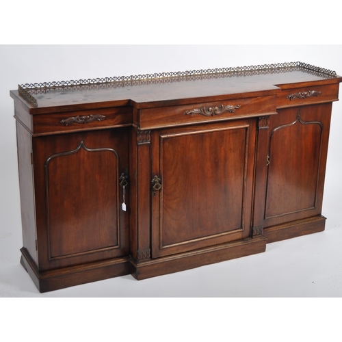 658 - A 19th Century Regency mahogany breakfront sideboard credenza cabinet having a brass gallery top wit... 