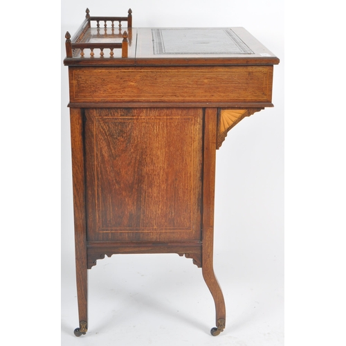 66 - A 19th Century Victorian rosewood and marquetry inlaid davenport desk in the manner of Edward & Robe... 