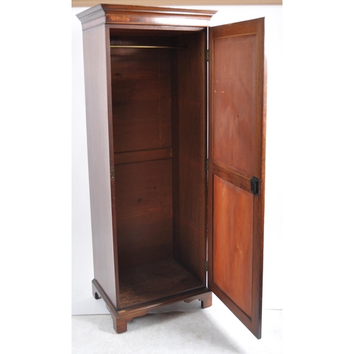 660 - A Victorian 19th century mahogany sentry box wardrobe. Raised on plinth base with full length fielde... 