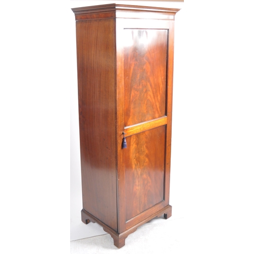 660 - A Victorian 19th century mahogany sentry box wardrobe. Raised on plinth base with full length fielde... 