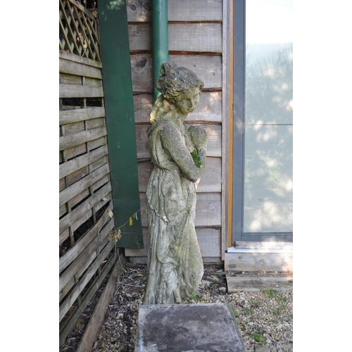 666 - A large 19th Century garden statue figurine in the form of a classical maiden, The figure dressed in... 