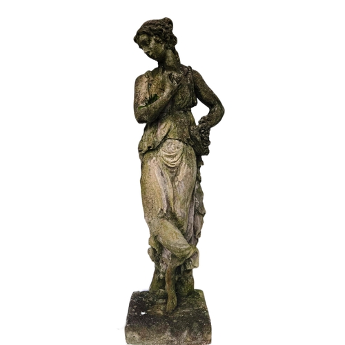 666 - A large 19th Century garden statue figurine in the form of a classical maiden, The figure dressed in... 