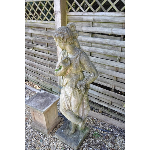 666 - A large 19th Century garden statue figurine in the form of a classical maiden, The figure dressed in... 