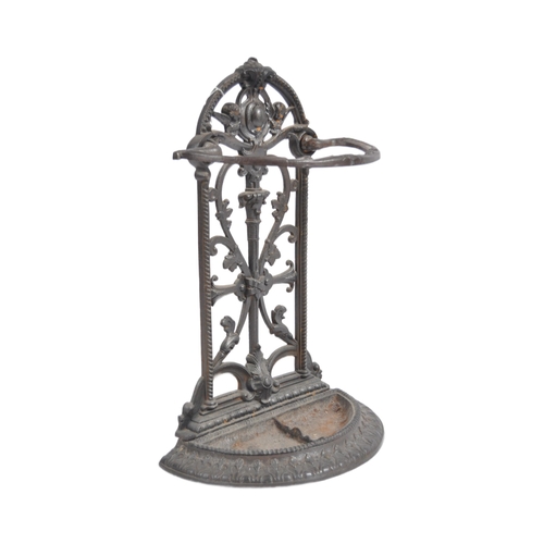 697 - A 19th Century Victorian cast iron stick stand in the manner of Coalbrookdale . Architectural form w... 