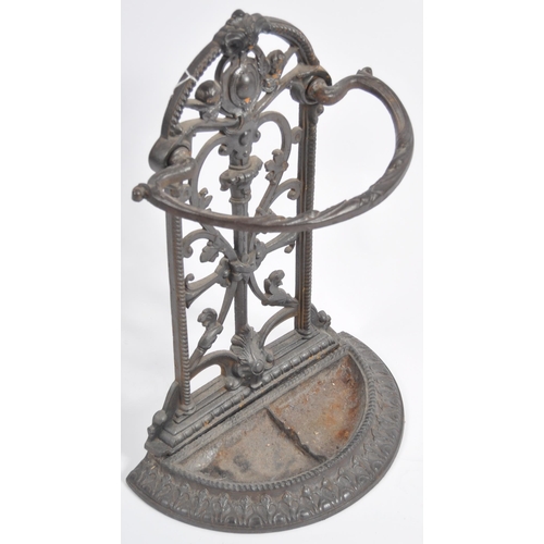 697 - A 19th Century Victorian cast iron stick stand in the manner of Coalbrookdale . Architectural form w... 