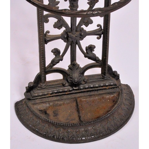 697 - A 19th Century Victorian cast iron stick stand in the manner of Coalbrookdale . Architectural form w... 