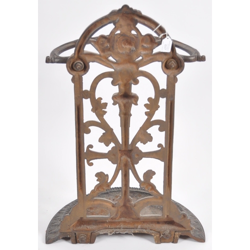 697 - A 19th Century Victorian cast iron stick stand in the manner of Coalbrookdale . Architectural form w... 