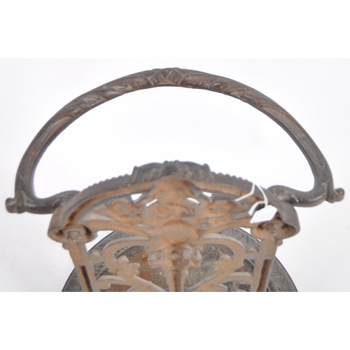 697 - A 19th Century Victorian cast iron stick stand in the manner of Coalbrookdale . Architectural form w... 