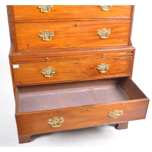 73 - An 18th Century George III mahogany chest on chest of drawers. Carved dentil work pediment top with ... 