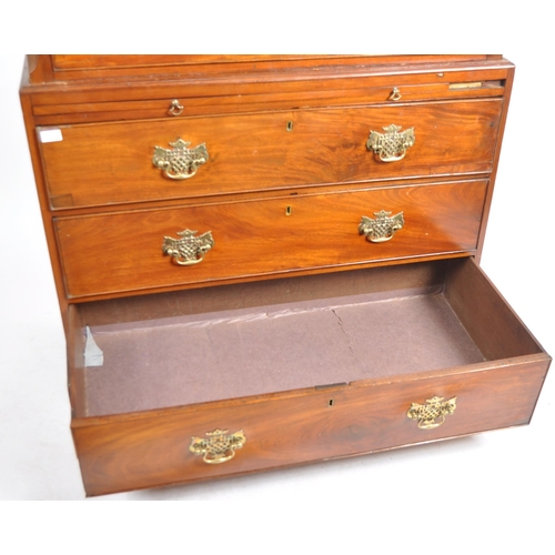 73 - An 18th Century George III mahogany chest on chest of drawers. Carved dentil work pediment top with ... 