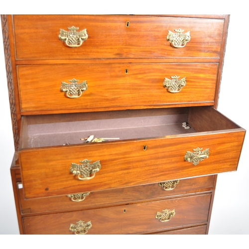 73 - An 18th Century George III mahogany chest on chest of drawers. Carved dentil work pediment top with ... 