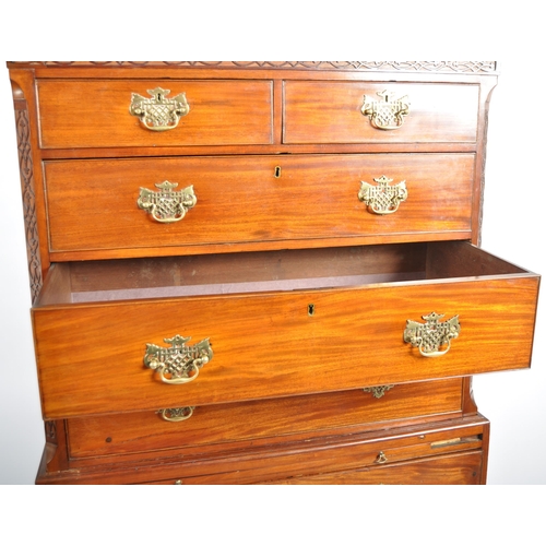 73 - An 18th Century George III mahogany chest on chest of drawers. Carved dentil work pediment top with ... 