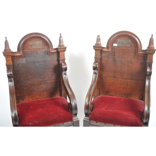 77 - A pair of large 19th Century Gothic ecclesiastical oak throne chairs in the manner of Pugin. Arched ... 