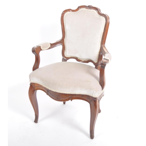 78 - A 19th Century French carved walnut fauteuil armchair / arm chair. Carved shell backrest with cushio... 