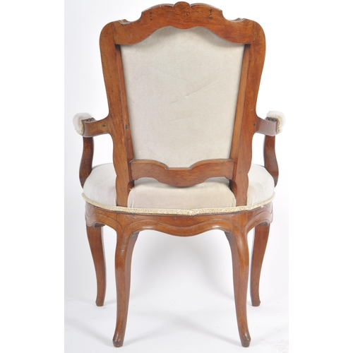 78 - A 19th Century French carved walnut fauteuil armchair / arm chair. Carved shell backrest with cushio... 