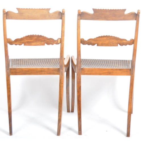 83 - A set of four early 19th Century Regency rosewood bar back dining chairs having carved brass inlaid ... 