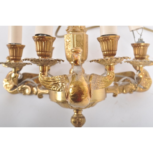 88 - A suite of antique revival gilt metal lighting comprising a ceiling light chandelier and pair of mat... 