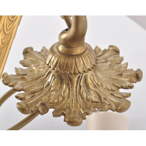 88 - A suite of antique revival gilt metal lighting comprising a ceiling light chandelier and pair of mat... 