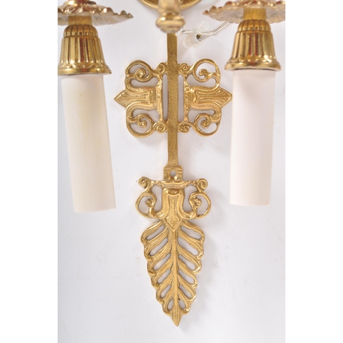 88 - A suite of antique revival gilt metal lighting comprising a ceiling light chandelier and pair of mat... 