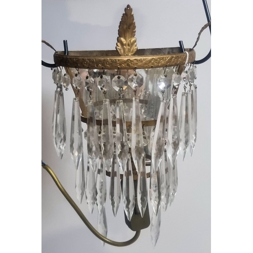 188 - A suite of early 20th Century gilt bronze and faceted glass lighting comprising a pair of mirror bac... 