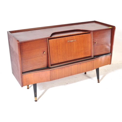 692 - Beautility - A vintage retro mid 20th century teak Beautility sideboard. The cocktail credenza havin... 