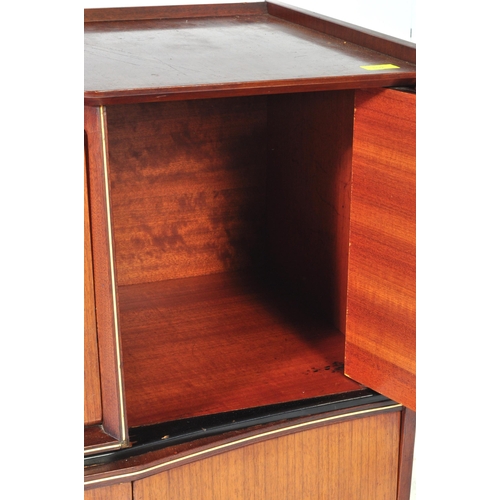 692 - Beautility - A vintage retro mid 20th century teak Beautility sideboard. The cocktail credenza havin... 