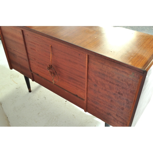 692 - Beautility - A vintage retro mid 20th century teak Beautility sideboard. The cocktail credenza havin... 