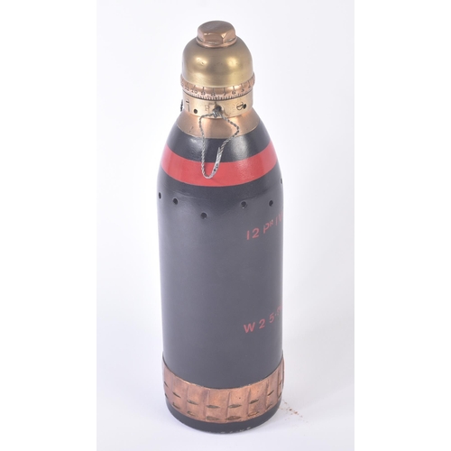 137 - An original Boer War era British 12 Pounder ( inert ) shrapnel shell. The shell with a copper drivin... 