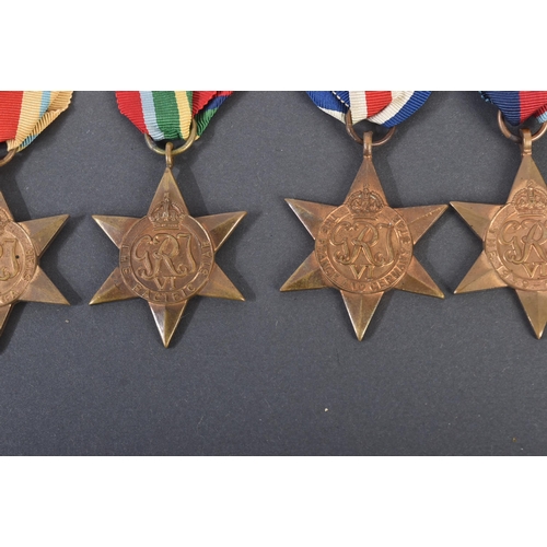 149 - A collection of WWII Second World War British campaign medal stars comprising; The Atlantic Star, Bu... 