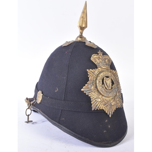 150 - A 19th Century Victorian Boer War period Connaught Rangers helmet. Blue cloth example with Victorian... 