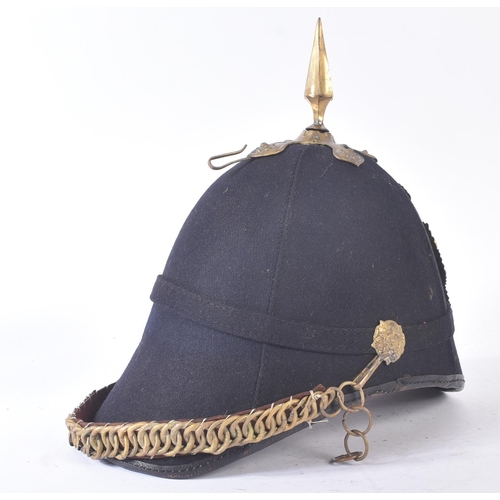 150 - A 19th Century Victorian Boer War period Connaught Rangers helmet. Blue cloth example with Victorian... 