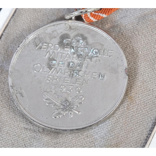 154 - A WWII Second World War Third Reich Nazi German 1936 Berlin Olympics civil decoration medal. The med... 