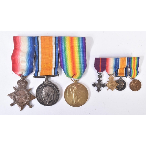 155 - A WWI First World War medal group with miniatures and a boxed MBE awarded to Lieutenant C. Mac Gilli... 