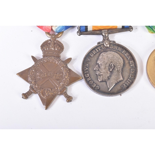 155 - A WWI First World War medal group with miniatures and a boxed MBE awarded to Lieutenant C. Mac Gilli... 