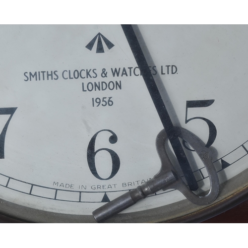 158 - An original British Army issue Smiths Clocks & Watches (London) Military wall clock. A wind up / mec... 