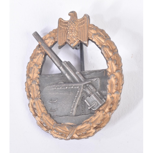 204 - Two WWII Second World War Third Reich Nazi German style badges comprising Coastal Artillery badge (m... 