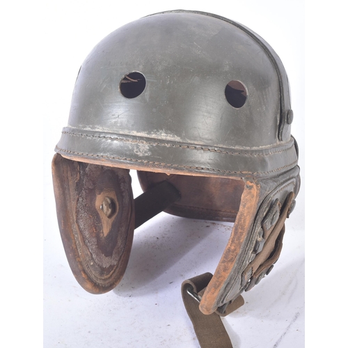 205 - A WWII Second World War US United States Tank crew M38 helmet. Compressed fibre like shell, ventilat... 