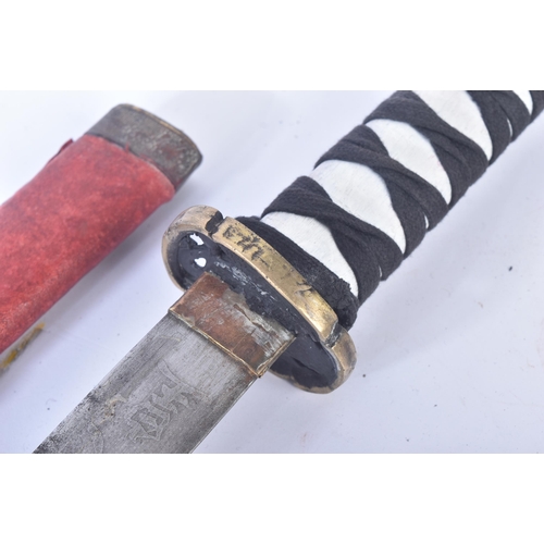 219 - A mid 20th Century Chinese Nationalist Katana / Japanese Samurai sword. Brass capped pommel, white p... 