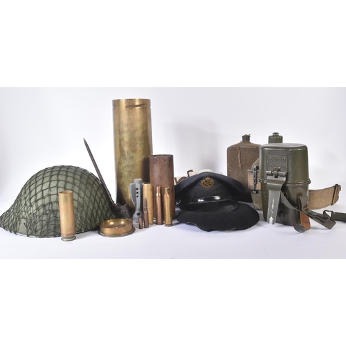 220 - A collection of assorted First, Second and post World War British militaria items to include; Tank R... 