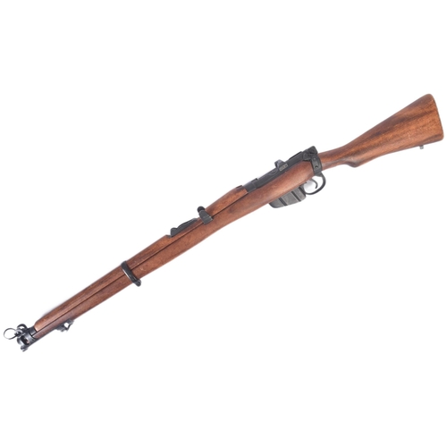 244 - A replica WWI First World War British 1914 Enfield style bolt action rifle. Dog leg style stock, int... 