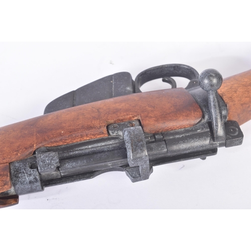 244 - A replica WWI First World War British 1914 Enfield style bolt action rifle. Dog leg style stock, int... 