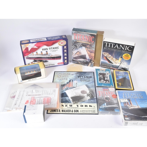 255 - RMS Titanic - a collection of assorted memorabilia to include; Gilbow RMS Titanic diecast model (box... 