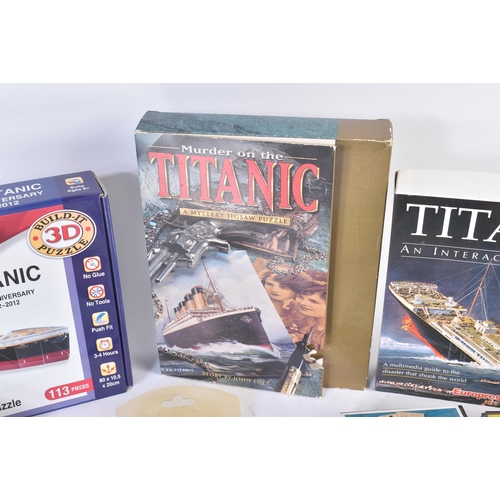 255 - RMS Titanic - a collection of assorted memorabilia to include; Gilbow RMS Titanic diecast model (box... 