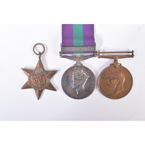 261 - A collection of WWI First and WWII Second World War British military medals comprising; General Serv... 