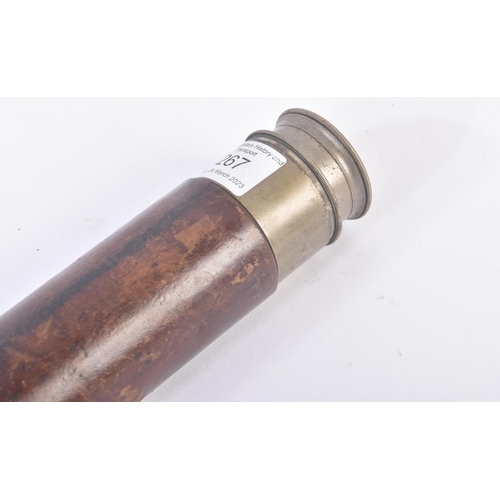 267 - An early 20th Century leather clad brass single draw telescope. Marked to the top barrel The R.N. Te... 