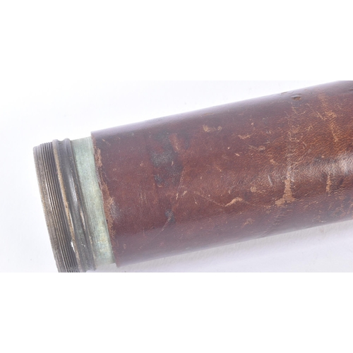 267 - An early 20th Century leather clad brass single draw telescope. Marked to the top barrel The R.N. Te... 