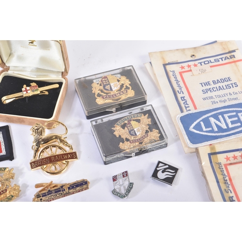 274 - A collection of assorted British Railways badges, pins and cloth patches to include; LNER, Southern,... 