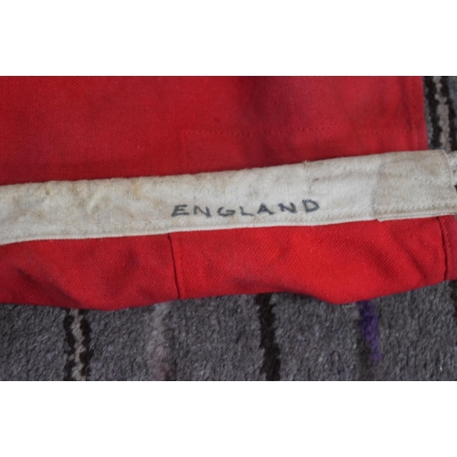 278 - An original vintage British Merchant Navy Ensign flag. Typical form with Union flag to the corner on... 